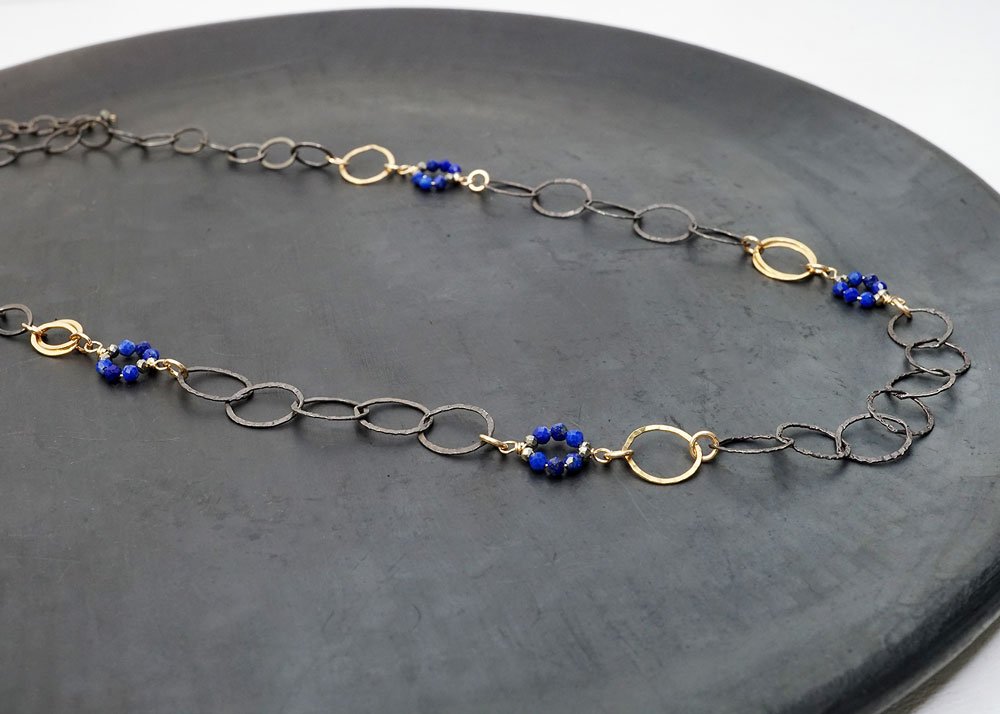 Oxidized sterling silver and 14k gold-filled chain with wrapped lapis and pyrite circles